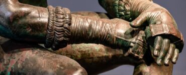 il pugile a riposo statua bronzea